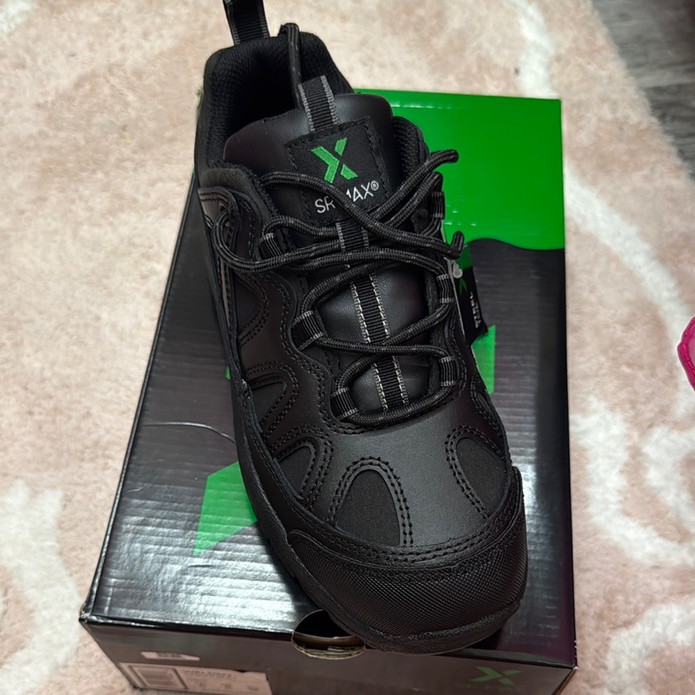 Black slip resistant steel toe work shoes for food and beverage.